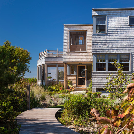 This modern, high-performance Martha's Vineyard Beach House integrates passive house principles and is designed to capture the island views, light, and breezes.